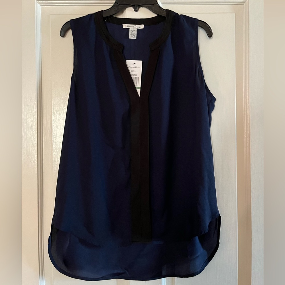 Kenneth Cole tank in blue with black strip detail down front.
